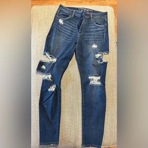 High rise jegging. Medium wash. Distressed. American Eagle size 12